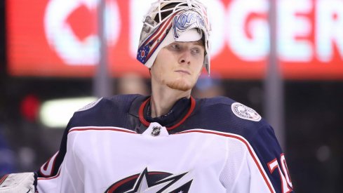 Columbus Blue Jackets goaltender Joonas Korpisalo looks on during a game against the Toronto Maple Leafs.