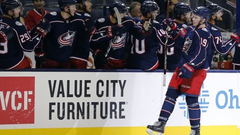 Liam Foudy celebrates scoring a pre-season goal for the Blue Jackets