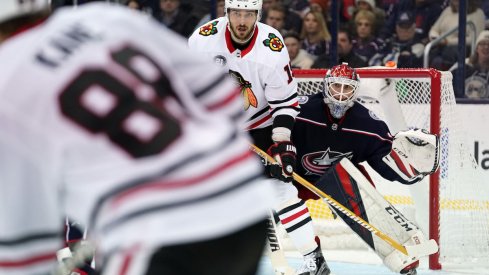 Columbus Blue Jackets goaltender Sergei Bobrovsky peers through traffic against the Chicago Blackhawks at Nationwide Arena.