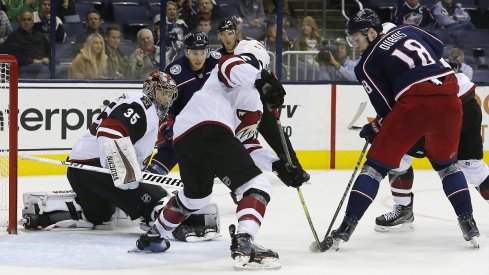 Pierre-Luc Dubois battles for a puck during the third period of the Blue Jackets ugly loss to the Arizona Coyotes