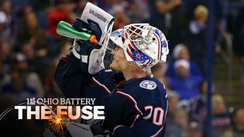 Columbus Blue Jackets goaltender Joonas Korpisalo hydrates during a stoppage in play at Nationwide Arena.