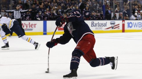 Columbus Blue Jackets forward Cam Atkinson scores his second of two goals against the Buffalo Sabres at Nationwide Arena.