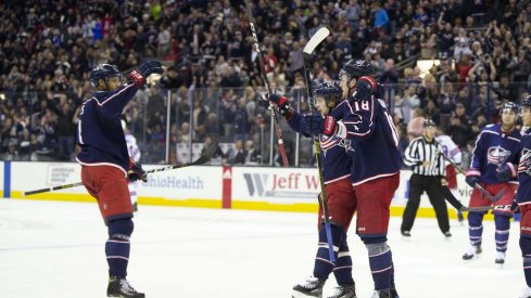 The Columbus Blue Jackets celebrate a goal scored by Pierre-Luc Dubois against the New York Rangers at Nationwide Arena.