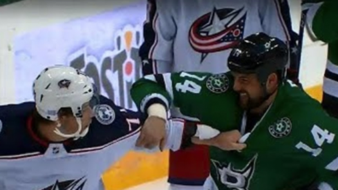 Josh Anderson and Jamie Benn get a big time bout during the first period of the Stars vs. Blue Jackets game