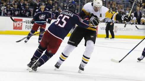 Markus Nutivaara takes on Evgeni Malkin in a game at Nationwide Arena