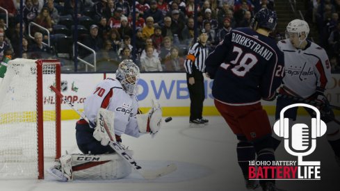 Oliver Bjorkstrand works to get a shot on goal against the Capitals Braden Holtby