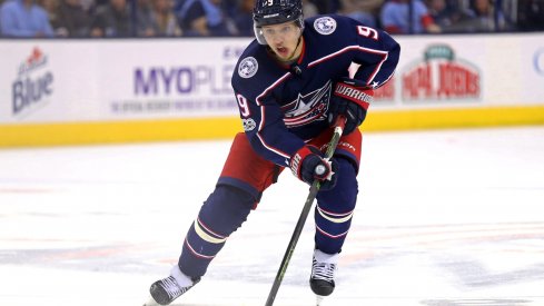 Artemi Panarin skates with the puck against the Los Angeles Kings 