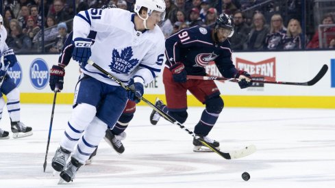 Anthony Duclair tries to chase down the Toronto Maple Leafs Jake Gardiner