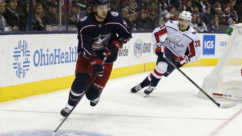 Artemi Panarin skates with the puck against the Washington Capitals