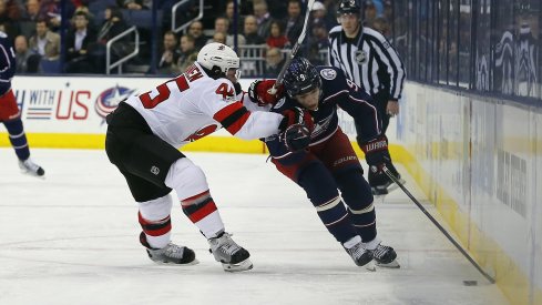 Artemi Panarin skates down the wall during the second period at Nationwide Arena