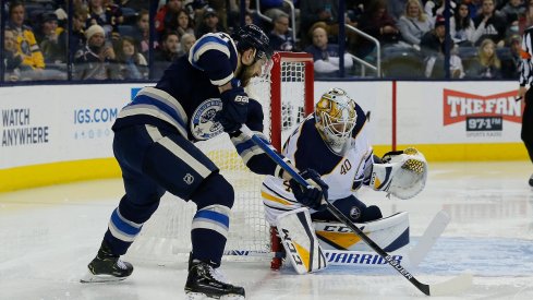 Nick Foligno tries a wraparound during the second period at Nationwide Arena.