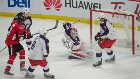 Sergei Bobrovsky tries to save the puck against the Ottawa Senators.