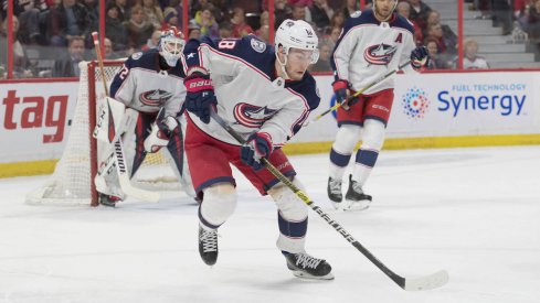 Columbus Blue Jackets center Pierre-Luc Dubois carries the puck out of the defensive zone against the Ottawa Senators.