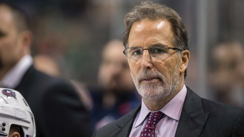 John Tortorella watches the ice as the Blue Jackets attempt to score.