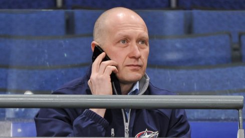 Jarmo Kekalainen working the phones 