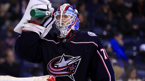 Columbus Blue Jackets goaltender Joonas Korpisalo takes a break during a game at Nationwide Arena.