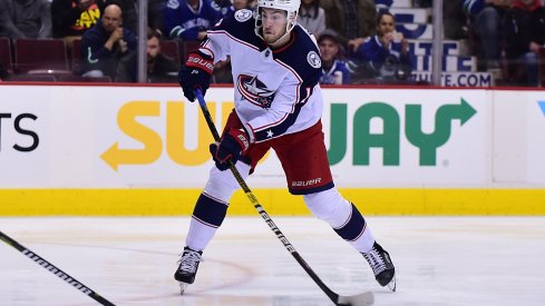 Mar 24, 2019; Vancouver, British Columbia, CAN; Columbus Blue Jackets forward Pierre-Luc Dubois (18) shoots the puck and scores against Vancouver Canucks goaltender Thatcher Demko (35) (not pictured) during the second period at Rogers Arena.