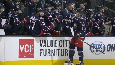 Mar 26, 2019; Columbus, OH, USA; Columbus Blue Jackets left wing Ryan Dzingel (19) celebrates a goal during the first period against the New York Islanders at Nationwide Arena. 