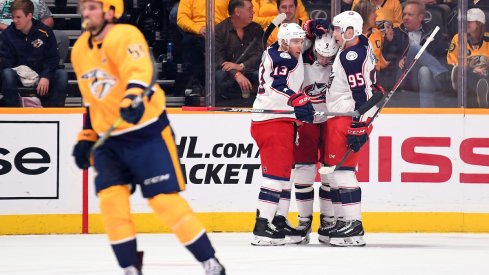 Columbus Blue Jackets forwards Cam Atkinson and Matt Duchene celebrate a goal scored against the Nashville Predators.