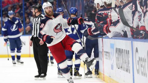 Columbus Blue Jackets defenseman David Savard (58) celebrates with teammates as after scoring a goal against the Tampa Bay Lightning during the third period of game one of the first round of the 2019 Stanley Cup Playoffs at Amalie Arena.