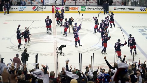 The Columbus Blue Jackets celebrate their first round win over the Tampa Bay Lightning at Nationwide Arena