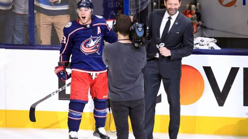 Cam Atkinson celebrates the Blue Jackets first ever playoff series win. 