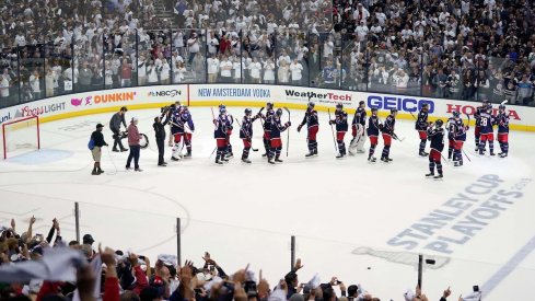 The Columbus Blue Jackets salute their crowd at Nationwide Arena after a Game 4 win over the Tampa Bay Lightning.