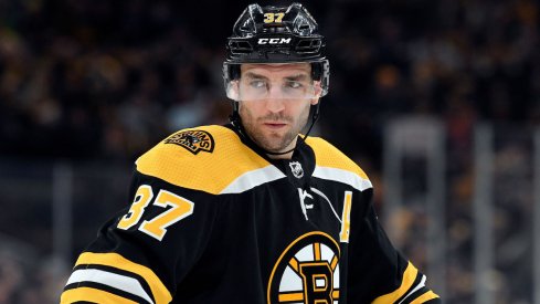 Boston Bruins center Patrice Bergeron looks on during a game against the Columbus Blue Jackets at TD Garden.