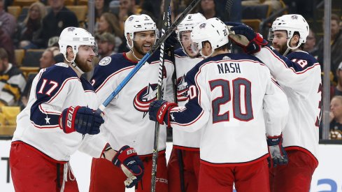 The Columbus Blue Jackets celebrate a third period goal scored by Brandon Dubinsky in Game 1 against the Boston Bruins at TD Garden.