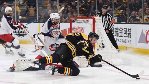 Apr 27, 2019; Boston, MA, USA; Boston Bruins center Joakim Nordstrom (20) tries to gain control of the puck in front of Columbus Blue Jackets goaltender Sergei Bobrovsky (72) during the second period in game two of the second round of the 2019 Stanley Cup Playoffs at TD Garden.