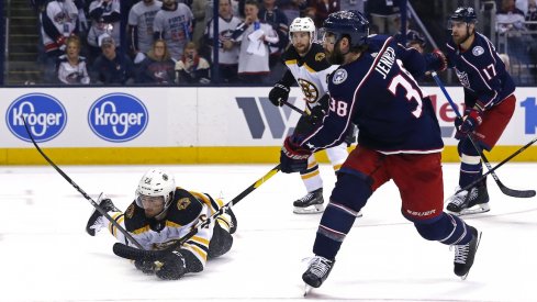 Columbus Blue Jackets center Boone Jenner (38) scores a goal on a shot against Boston Bruins defenseman Connor Clifton (75) in the first period during game three of the second round of the 2019 Stanley Cup Playoffs at Nationwide Arena.