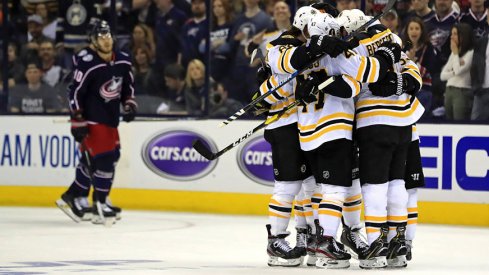 Patrice Bergeron celebrates with his Bruins teammates after scoring to put Boston up 2-0 on Columbus in Game 4.