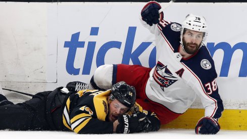 Columbus Blue Jackets center Boone Jenner fights for the puck in Game 5 against the Boston Bruins at TD Garden.