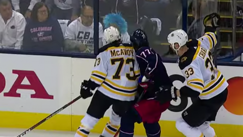 Charlie McAvoy lays a bad hit on Josh Anderson late in the second period of Bruins-Blue Jackets