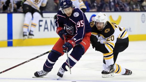 Matt Duchene skates around Joakim Nordstrom of the Boston Bruins
