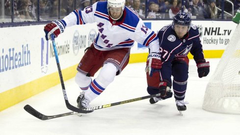 Kevin Hayes and Ryan Murray battle for the puck at Nationwide Arena