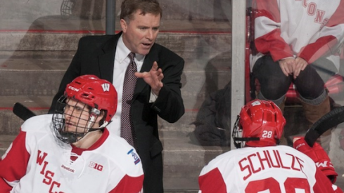 Mike Eaves, new head coach of the Cleveland Monsters, guides the University of Wisconsin men's hockey team.