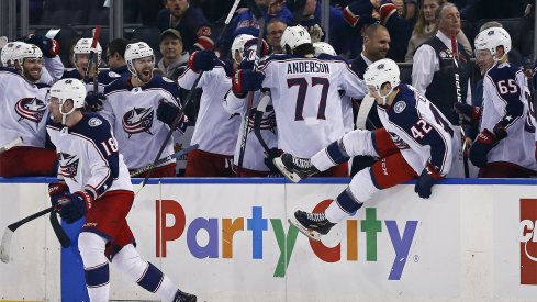 The Columbus Blue Jackets bench celebrates after defeating the New York Rangers in a shoot out at Madison Square Garden.