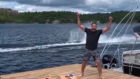 Brandon Dubinsky celebrates after throwing a perfect football to Josh Anderson.