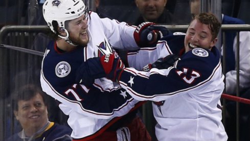 Columbus Blue Jacket forwards Cam Atkinson and Josh Anderson celebrate after defeating the New York Rangers in April of 2019 at Madison Square Garden to clinch a playoff berth. 