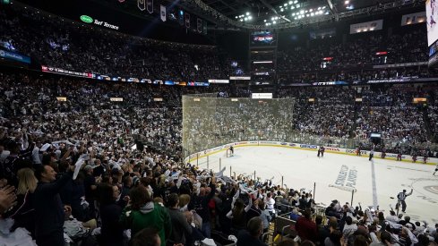 Fans cheer during a stop in play of the game of the Boston Bruins against the Columbus Blue Jackets in the first period during game six of the second round of the 2019 Stanley Cup Playoffs at Nationwide Arena. 