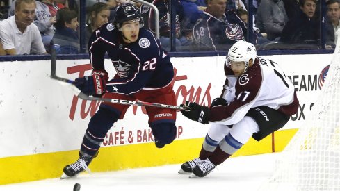 Oct 9, 2018; Columbus, OH, USA; Columbus Blue Jackets left wing Sonny Milano (22) looks to pass as Colorado Avalanche center Tyson Jost (17) defends during the first period at Nationwide Arena.