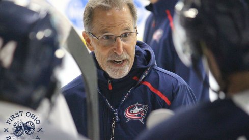 Columbus Blue Jackets head coach John Tortorella instructs his players during a training camp practice at the OhioHealth Ice Haus.