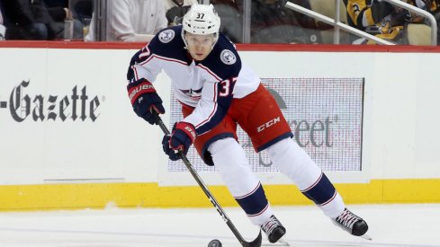 Markus Hannikainen skates with the puck during a game against the Pittsburgh Penguins at PPG Paints Arena.