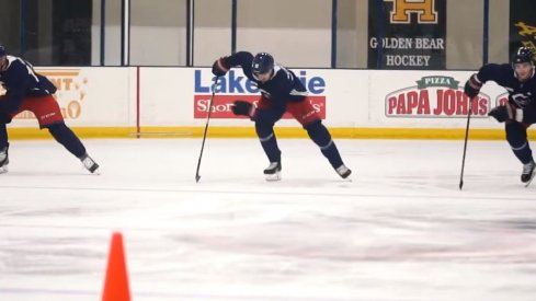 A group of players participates in a bag skate as they try to complete a drill.