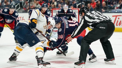 Oct 7, 2019; Columbus, OH, USA; Buffalo Sabres center Casey Mittelstadt (37) battles against Columbus Blue Jackets center Alexander Wennberg (10) for the face-off in the second period at Nationwide Arena.