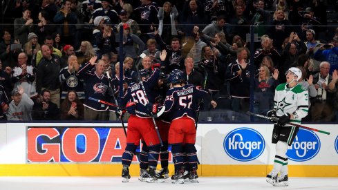 Oct 16, 2019; Columbus, OH, USA; Columbus Blue Jackets center Alexander Wennberg (10) celebrates with teammates after scoring a goal against the Dallas Stars in the first period at Nationwide Arena.