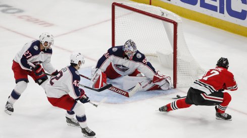 Oct 18, 2019; Chicago, IL, USA; Chicago Blackhawks center Dylan Strome (17) tries to score against Columbus Blue Jackets goaltender Elvis Merzlikins (90) during the second period at United Center.