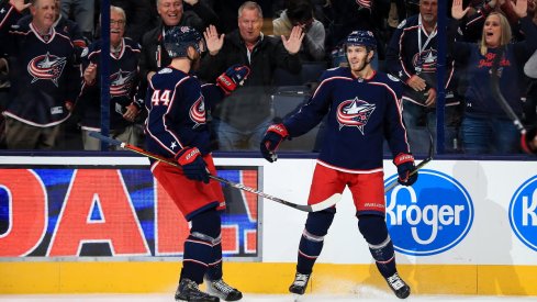 Alexander Wennberg celebrates with Vladislav Gavrikov