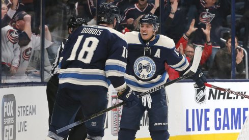 Oct 24, 2019; Columbus, OH, USA; Columbus Blue Jackets right wing Cam Atkinson (13) celebrates a goal against the Carolina Hurricanes during overtime at Nationwide Arena. Mandatory Credit: Russell LaBounty-USA TODAY Sports